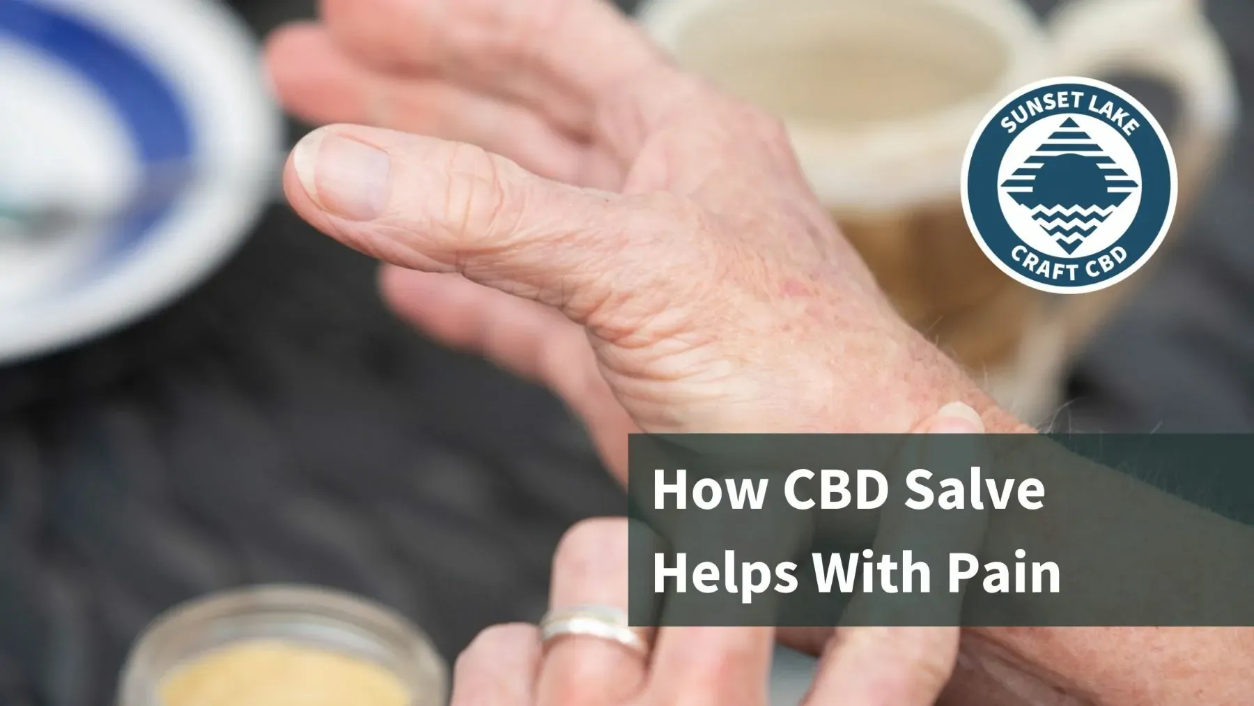 Two hands applying CBD salve. Text reads "How CBD Salve Helps With Pain"