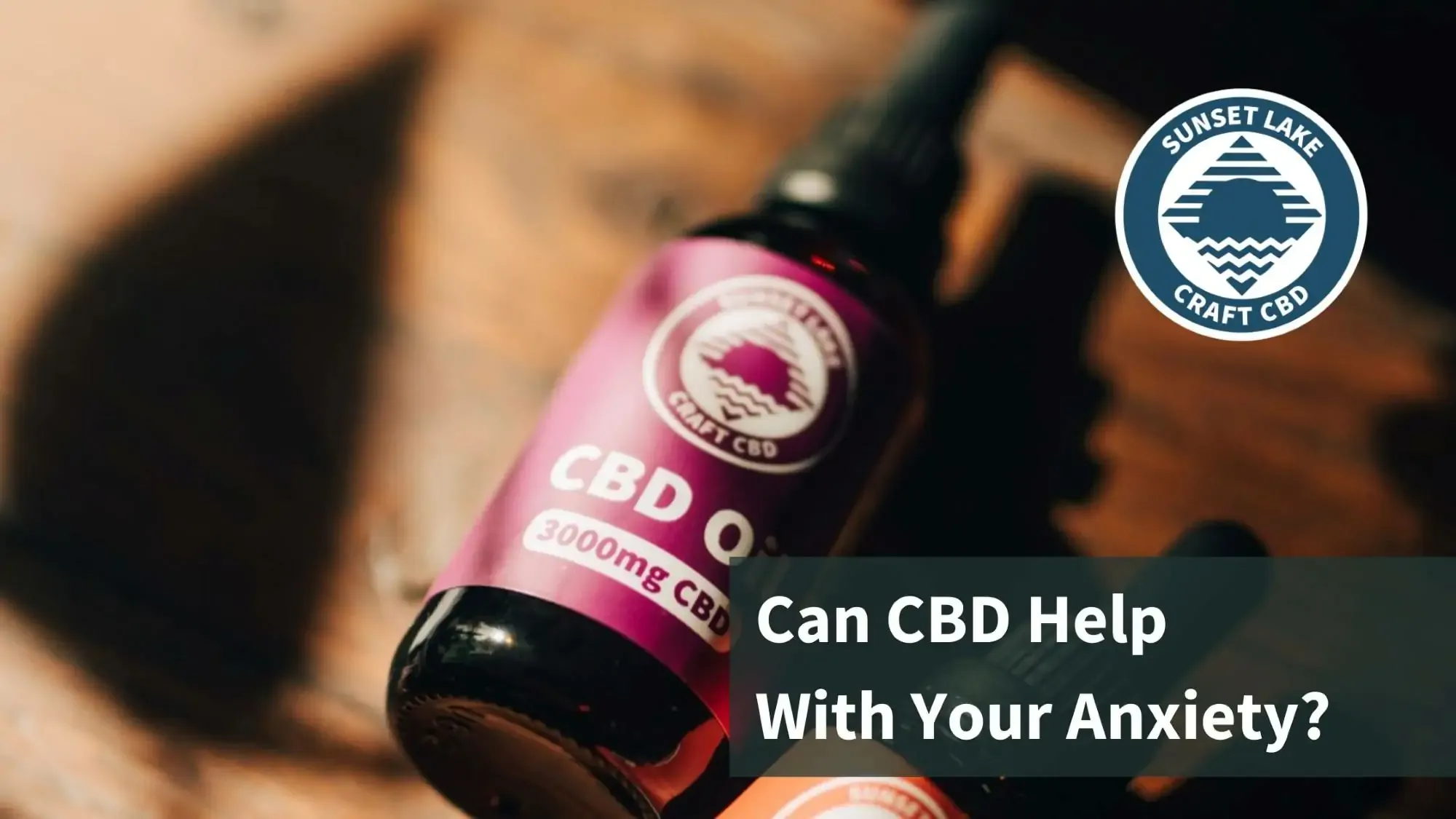 Sunset Lake CBD Oil laying on a wooden table