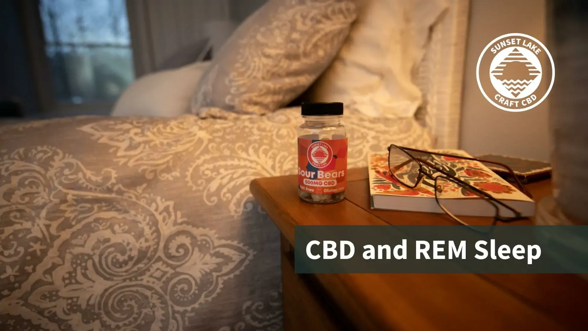 Bottle of CBD Gummies on a nightstand with the text "CBD and REM sleep"