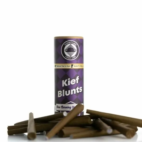 A tube of CBD Kief Blunts surrounded by pre-rolled blunts
