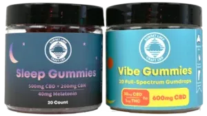 A jar of CBN sleep gummies next to the full spectrum Vibe Gummies